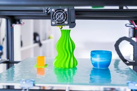 3d printer mechanism working during the processes. Modern 3D printing.. Stock Photos