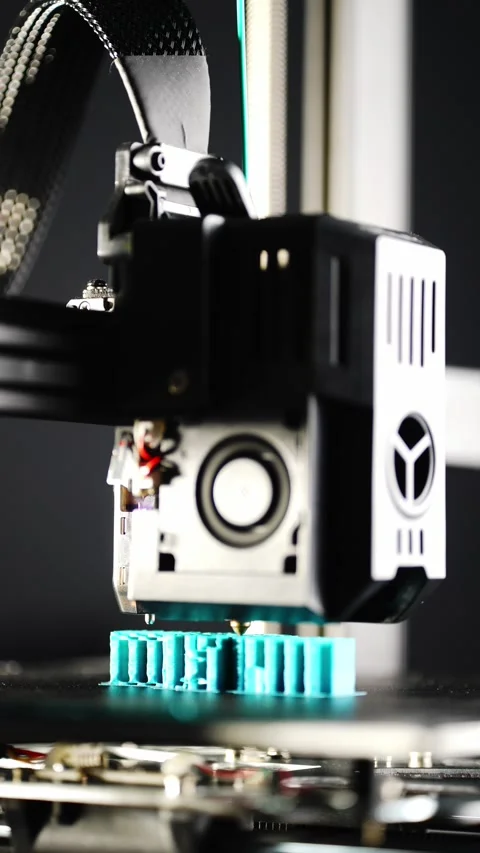 3D printer operation showing the process of creating a detailed Stock Footage 315771756