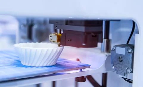 3D printer or additive manufacturing and robotic automation technology. Stock Photos