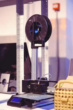 The 3D printer performs the creation of the product. Modern three-dimensional Stock Photos