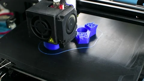 The 3D printer printed blue plastic model Stock Footage 130746558