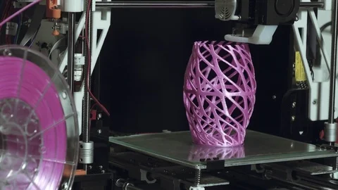 3D printer printing an art object,plastic filament in view Stock Footage 74504712