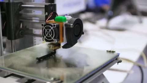 3d printer is printing black plastic detail. 3d printing project concept. Stock Footage 94769654