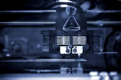 3D printer printing black shapes close-up Automatic three dimensional 3d printer Stock Photos