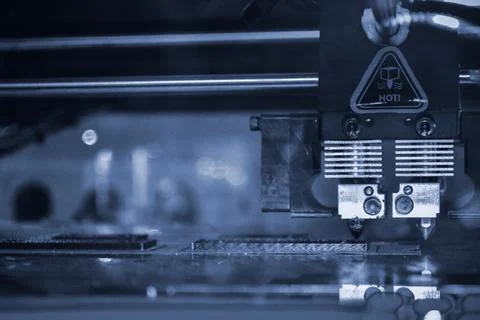 3D printer printing black shapes close-up Automatic three dimensional 3d printer Stock Photos