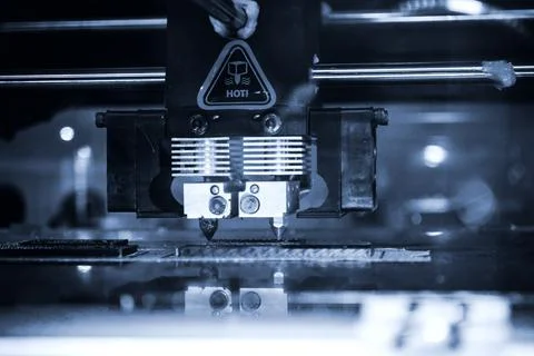 3D printer printing black shapes close-up Automatic three dimensional 3d printer Stock Photos