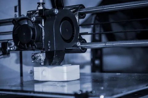 3D printer printing black shapes close-up Automatic three dimensional 3d printer Stock Photos