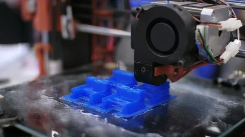 3d printer is printing blue plastic details. 3d printing project concept 库存影片 94775482
