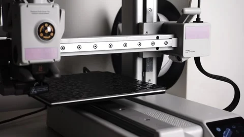 3D Printer Printing, Cleaning Nozzle, and Extruding Filament Stock Footage 300874906