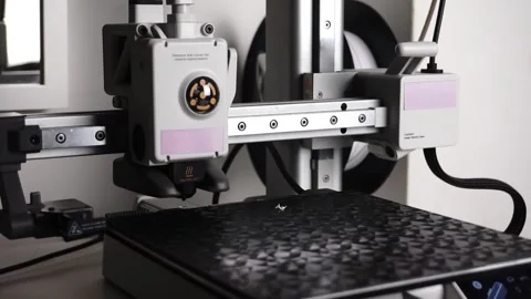 3D Printer Printing, Cleaning Nozzle, and Extruding Filament Stock Footage 300874959