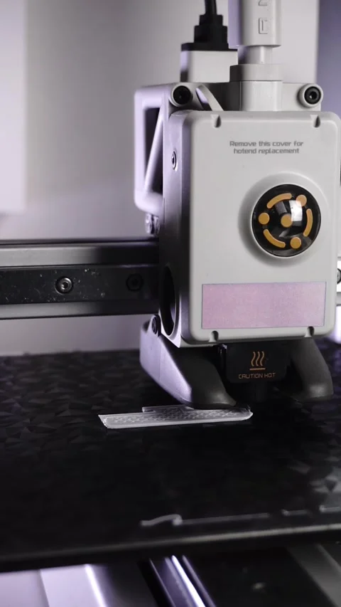 3D Printer Printing, Cleaning Nozzle, and Extruding Filament Stock Footage 300874971