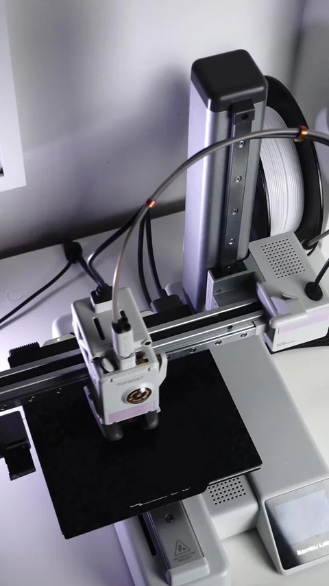 3D Printer Printing, Cleaning Nozzle, and Extruding Filament Stock Footage 300875081