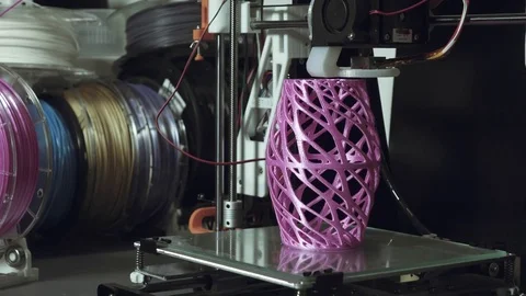 3D printer printing a complex object,an art household item Video stock 74497440
