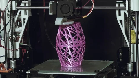 3D printer printing a complex object,an art household item Stock Footage 74498169