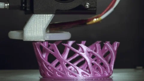 3D printer printing a complex object,an art household item Video stock 74500147