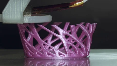 3D printer printing a complex object,an art household item Video stock 74500359