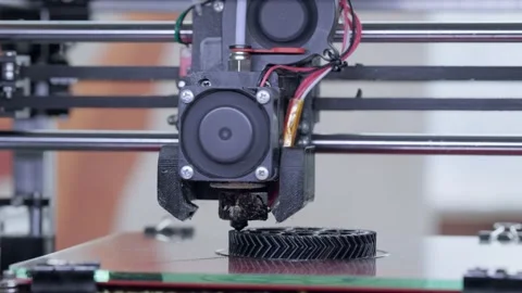 3D printer printing detail from plastic. Automatic three dimensional 3d printer Stock Footage 236782921
