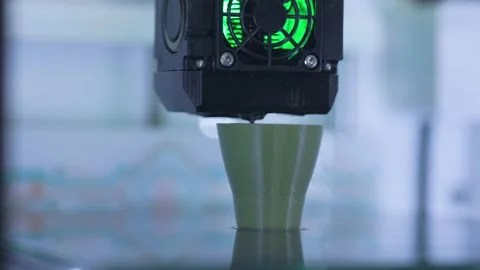 3D printer printing detail from plastic. Automatic three dimensional 3d printer Stock Footage 236783281