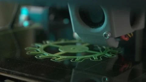 3D printer printing gear object from plastic. Automatic three dimensional 3d Stock Footage 236554436