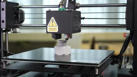 3D printer printing a gray screw Stock Footage 104185648