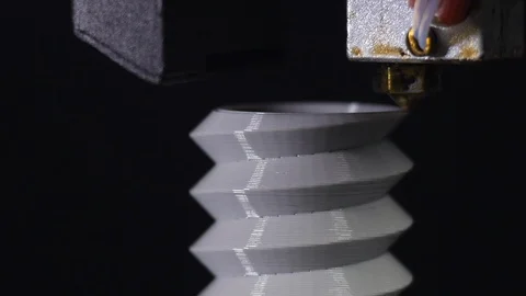 3D printer printing a gray screw, Black background Stock Footage 104193652
