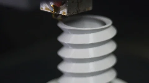 3D printer printing a gray screw, Black background Stock Footage 104194640