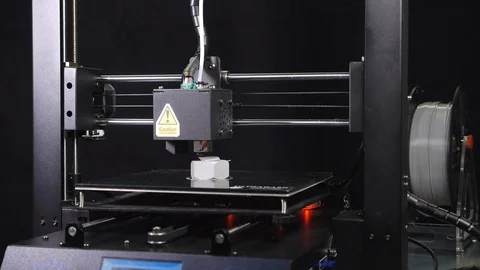 3D printer printing a gray screw, Black background Stock Footage 104195134