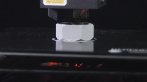3D printer printing a gray screw, Black background Stock Footage 104195209
