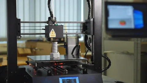 3D printer printing a gray screw Stock Footage 104201590