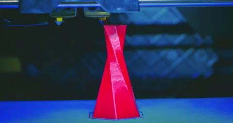 3D printer printing isolated volume triangular object red color Stock Footage 149998892