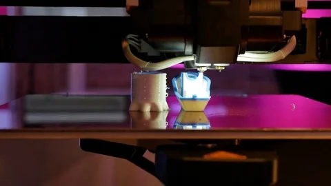 3D printer printing a little model boat, process new printing technology Stock Footage 80939805