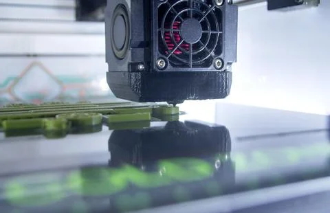3D printer printing model. Equipment of 3D printer during process of printing Stock Photos