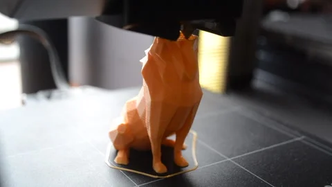 3D printer printing an object A 3D printer printing object from molten plastic Stock Footage 328700409
