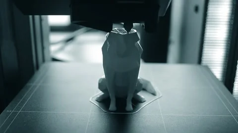 3D printer printing an object A 3D printer printing object from molten plastic Stock Footage 328700502