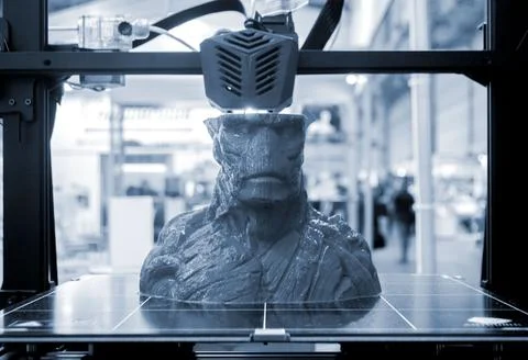 3D printer printing object close-up. Process creating three-dimensional model Stock Photos