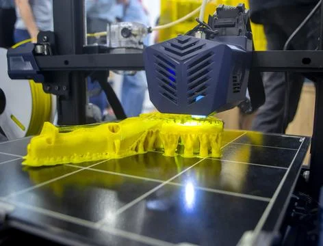 3D printer printing object close-up. Process creating three-dimensional model Stock Photos