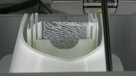 3D printer printing an object from plastic. 4K Video stock 131991250