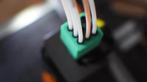 3d printer printing an object on the tray with pla filament, corn starch Stock Footage 317170554