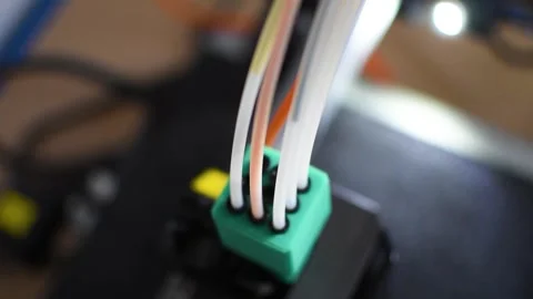 3d printer printing an object on the tray with pla filament, corn starch Stock Footage 317170556
