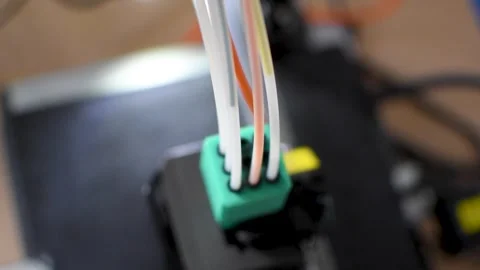 3d printer printing an object on the tray with pla filament, corn starch Stock Footage 317170558