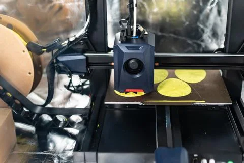 3d printer printing an object on the tray with pla filament, corn starch, n.. Stock Photos