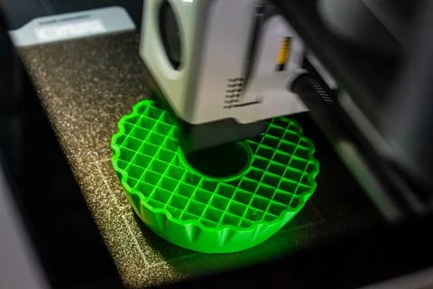 3d printer printing an object on the tray with pla filament, corn starch, n.. Stock Photos