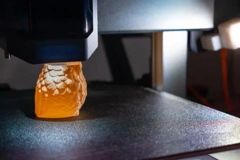 3d printer printing an object on the tray with pla filament, corn starch Stock Photos