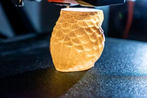 3d printer printing an object on the tray with pla filament, corn starch Stock Photos