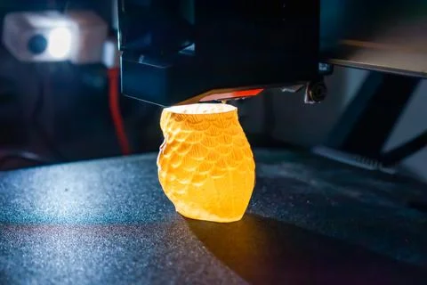 3d printer printing an object on the tray with pla filament, corn starch Stock Photos