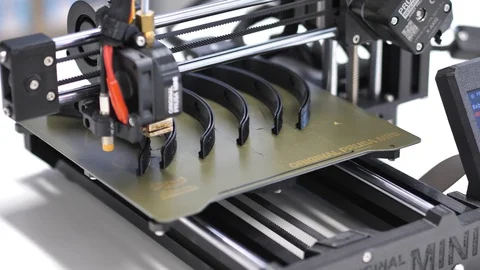 3D Printer printing Open Source COVID19 Masks for Dentist Office Stock Footage 127710188