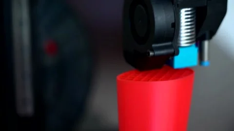 3D printer printing plastic last shoe prototype from red filament, real time Stock Footage 149989937