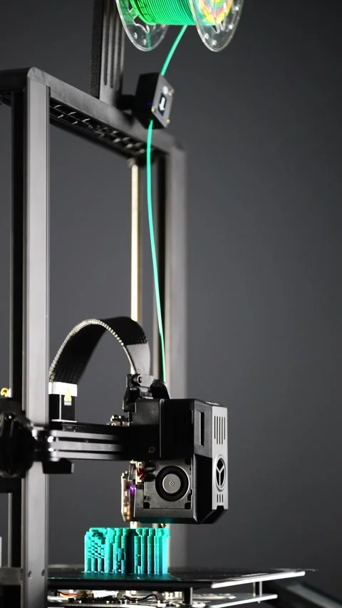 3D printer printing plastic parts at a modern factory Stock Footage 325307646