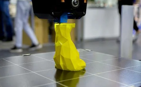 3D printer printing prototype molten plastic Process of creating prototype model Stock Photos