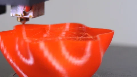 3D printer printing a red vase, White background Stock Footage 104397794